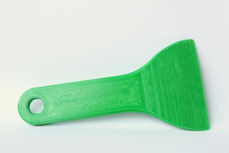 Ice scraper with rounded edge for inside of windshield