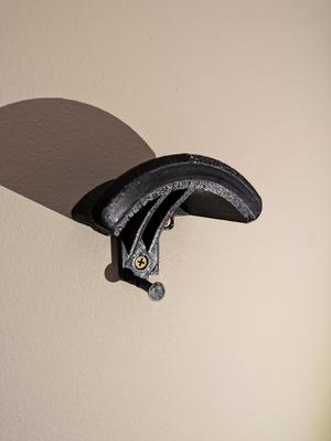 Motorcycle wall helmet holder