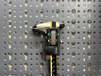 Parametric caliper holder for Kupper pegboard