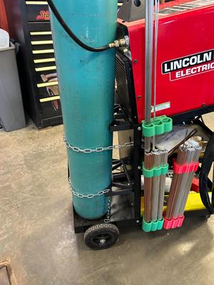 Argon bottle tank bracket for welding