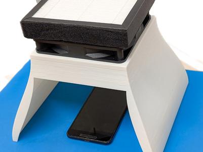"Laminar Flow" Hood for Phone Screen Protection