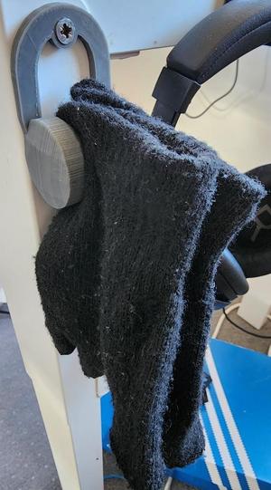 Headphone shaped clip for gloves or anything else