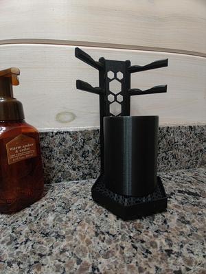 Toothbrush and cup holder