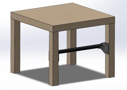 IKEA lack spool holder. (between legs)