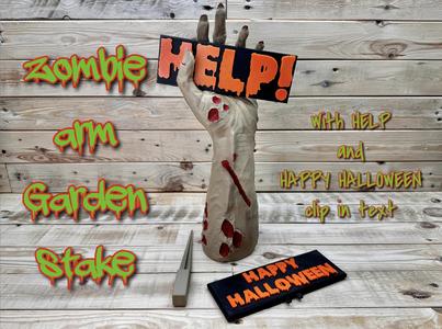 Zombie arm garden stake. with happy halloween and help signs
