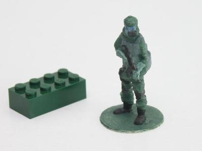 Gas mask soldier on stand