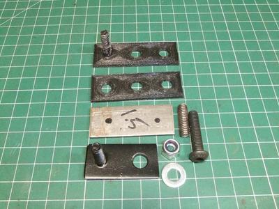 Radiator drop brackets for a body lift
