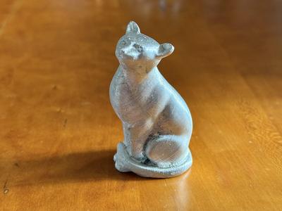 Water-soluble mold for cast-metal Cat