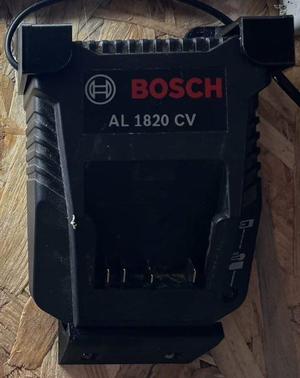 Fixation pour chargeur Bosch AL1820cv