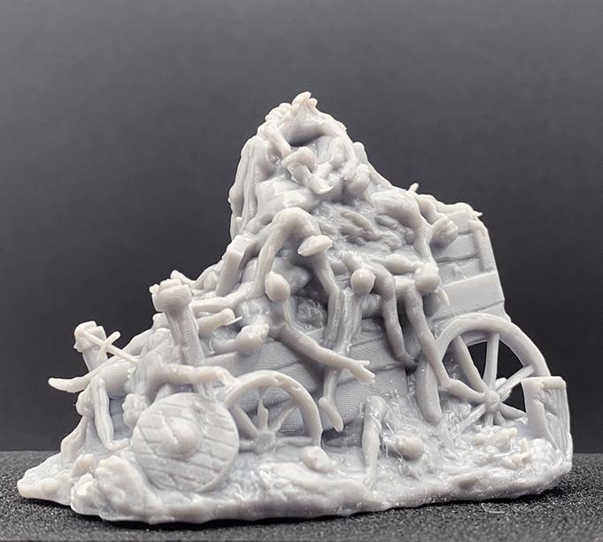 Pile of bodies on a wagon