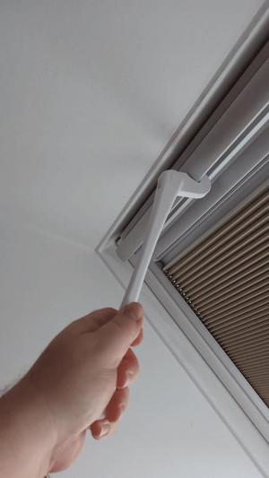 Extended arm to operate Velux roof window   