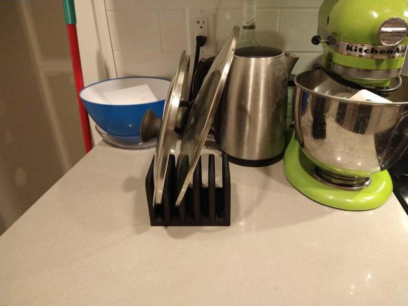 Cutting board or pan lid stand.