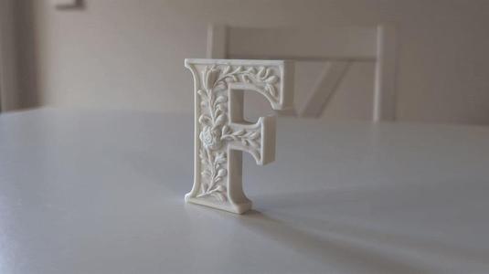 Standing Letter F in a Gypsum Floral Style