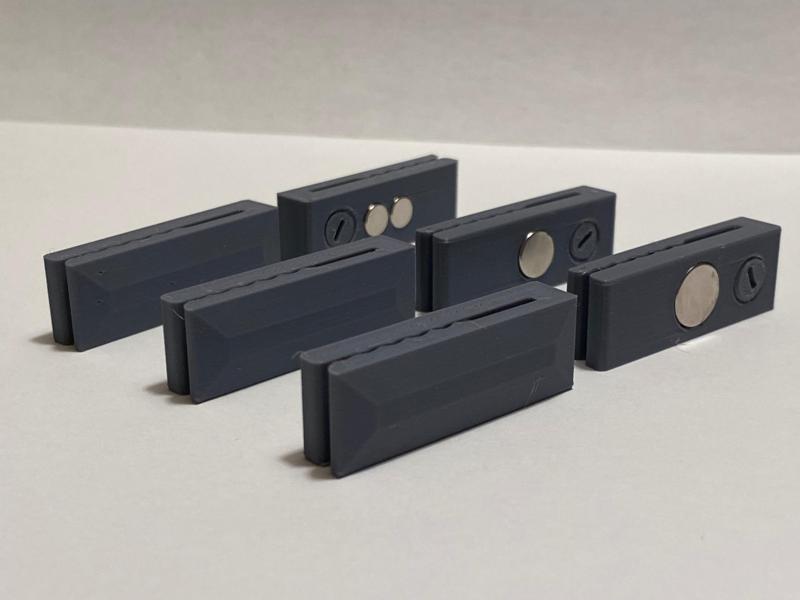 Overlapping Magnetic curtain clips