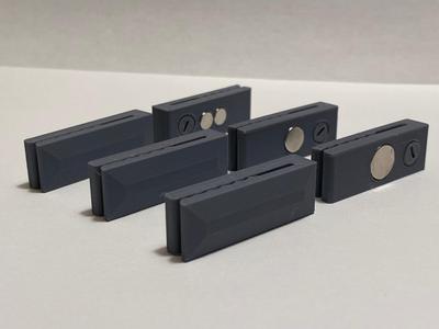 Overlapping Magnetic curtain clips