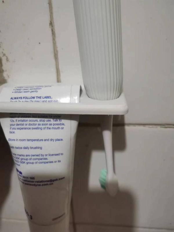 Toothbrush and Toothpaste Storage and Drying Rack