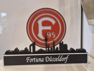 Fortuna Düsseldorf against a Düsseldorf skyline
