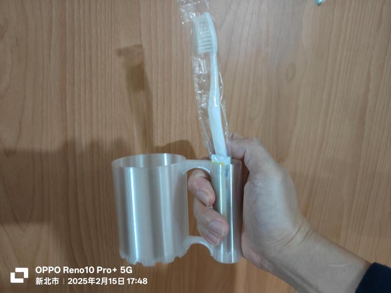 Mouthwash cup with toothbrush holder