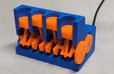 Power unit for 4 cylinder engine fidget toy