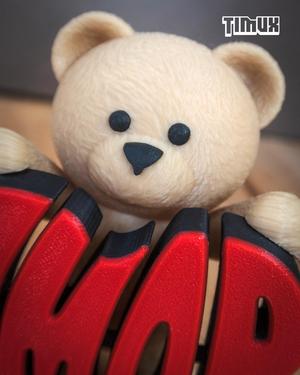 TEDDY BEAR WITH A "AMOR" SIGN
