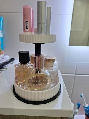 Rotating double perfume and accessories stand