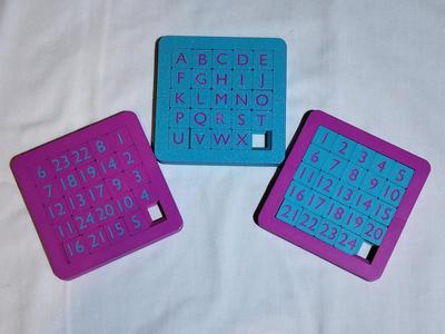 Double sided 5x5 sliding block puzzle
