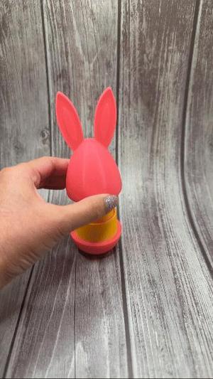 Expanding Egg wBunnyEars Fidget –Sep Yolk–noAMSreq