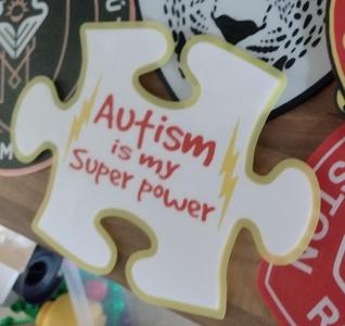 Autism is my super power sign 
