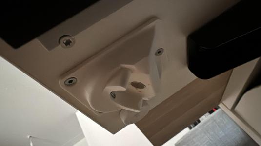 Bottle opener under desk