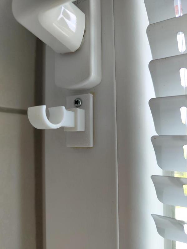 Curtain rod holder