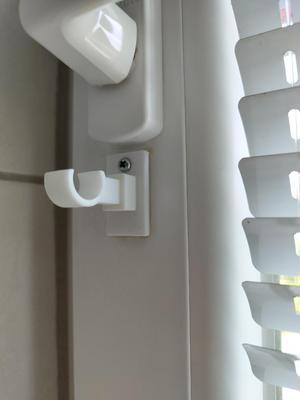 Curtain rod holder
