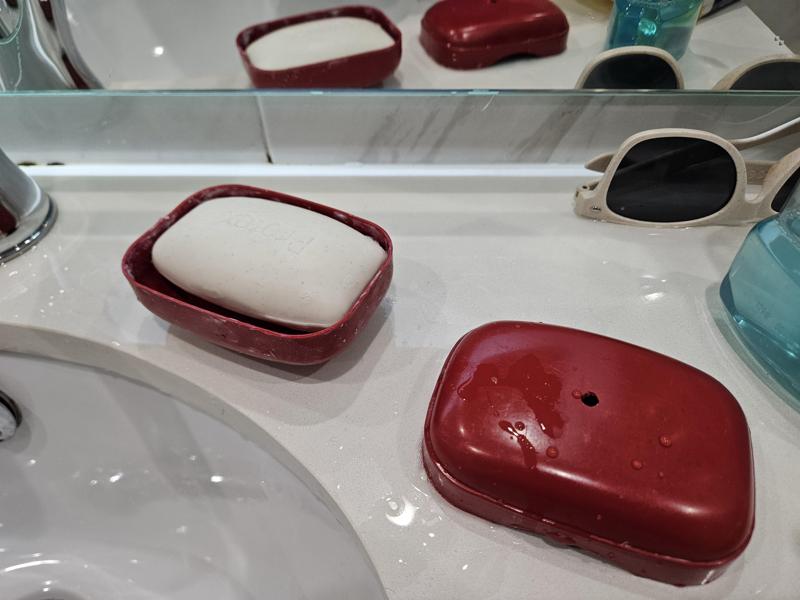 Raiser for soap holder