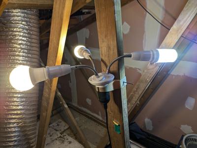 Tri-light clamp for roof studs