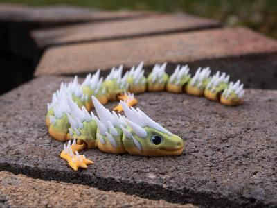 Cute multicolor articulated spikey dragon
