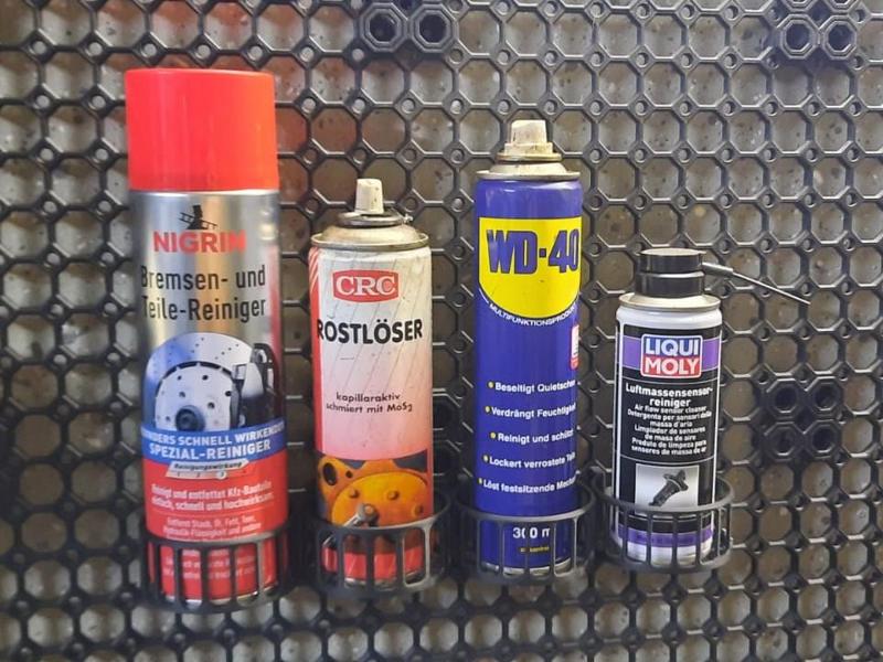 Spray can holder for multiboard