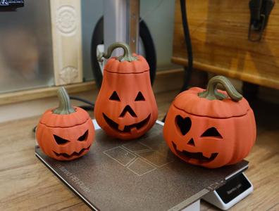3 carved pumpkins