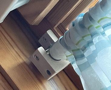 Holder for curtain rod with fixing screw printed with wood filament