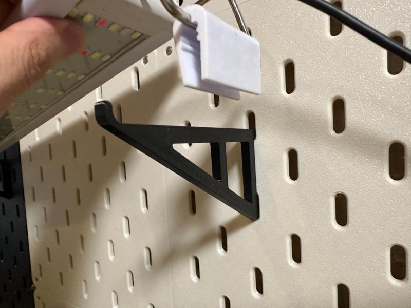 SKADIS pegboard hook rack, hooks, lights, guns, with anti-drop hooks