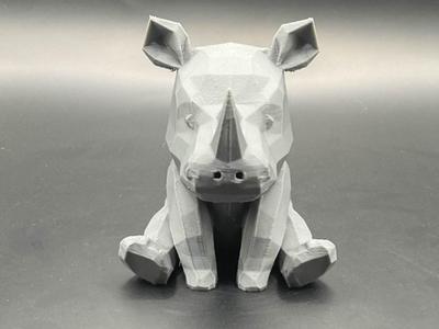 Cute Rhino sitting down