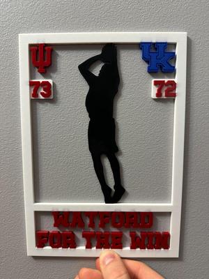 "The Wat Shot" wall sign