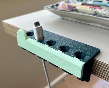 Desk cable tidy / organiser with snap on cover