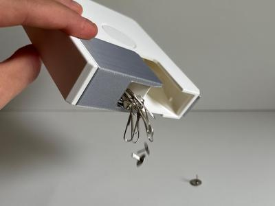 Floppy, tape dispenser with paper clips/push pins storage.