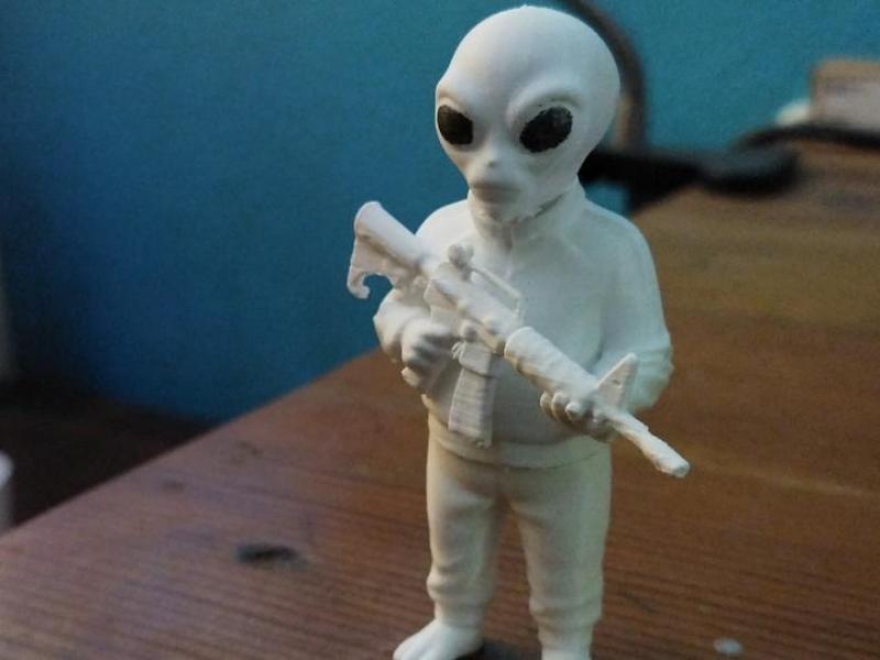 Armed Tracksuit Alien