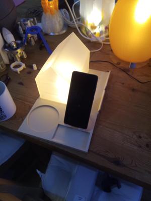 Bedside lamp and book rest remixed with added phone stand. Hue bulb compatible