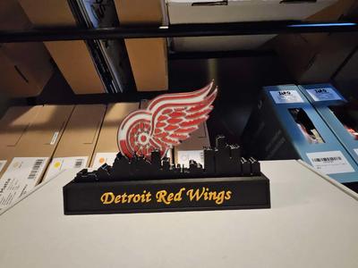 Detroid Red Wings with skyline of Detroid NHL