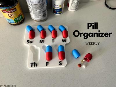 Weekly Pill Organizer - pill shaped capsule 