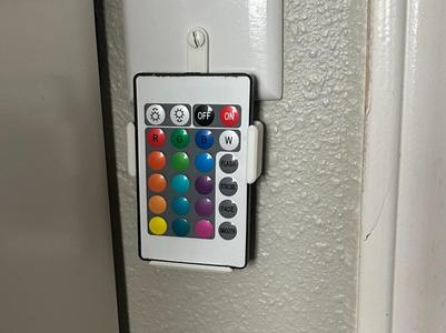 LED remote holder for light switch