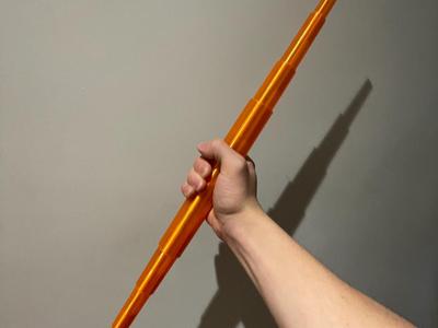 Retractable staff with split function