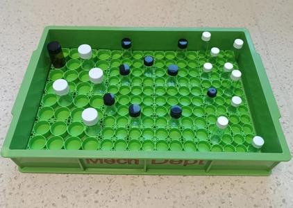 Modular base plate for glass vials   