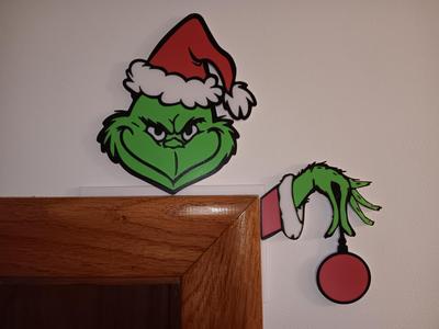 The Grinch Holding Christmas Bulb Door Corner